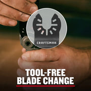 Photo of hands changing Craftsman oscillating tool blade CMAO552 with tool-free feature, close-up on the blade.