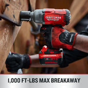 Photo of Craftsman cordless impact wrench CMCF940M1 in use, red and black design, worker with gloves.