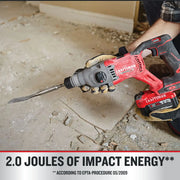 Photo of Craftsman rotary hammer CMCH234B used for chiseling concrete, shown in action, red and black design.