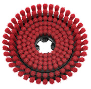 A close-up view of a circular industrial brush attachment with dense red bristles arranged in concentric rings on a black base.