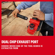 Photo of person using Craftsman hand planer CMCW350B on wood, showing dual chip exhaust port in workshop.