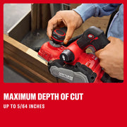 Photo of hands adjusting CRAFTSMAN cordless planer CMCW350B, red and black, woodworking context.
