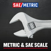 Craftsman adjustable wrench CMMT81624 close-up on black background, showing metric and SAE scale marking.