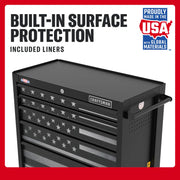Craftsman CMST98282P black tool chest with USA flag drawer graphics, angled front view, surface protection liners.