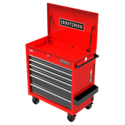A red rolling tool chest with multiple drawers, a top compartment with the lid open, and black handles, branded with the word 'CRAFTSMAN' on the front and inside lid.
