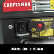 Close-up of CRAFTSMAN CMXGBAM213101 push-button electric start with power outlet and red button on equipment.
