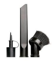 Three black vacuum cleaner attachments are displayed upright on a white background. From left to right: a narrow nozzle tool with a cap, a long crevice tool, and a round brush attachment with bristles.