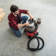 Photo of Craftsman wet/dry vacuum CMXZVBE38754 with filter change in progress, vacuum hose visible.