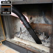 CRAFTSMAN CMXZVBE38776 vacuum nozzle cleaning cold ash in fireplace, close-up photo.