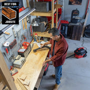 Photo of Craftsman wet/dry vacuum CMXZVBE38785 cleaning wood sawdust in workshop jobsite setting.